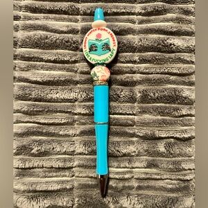 Vibrant Blue Pen with Decorative Top